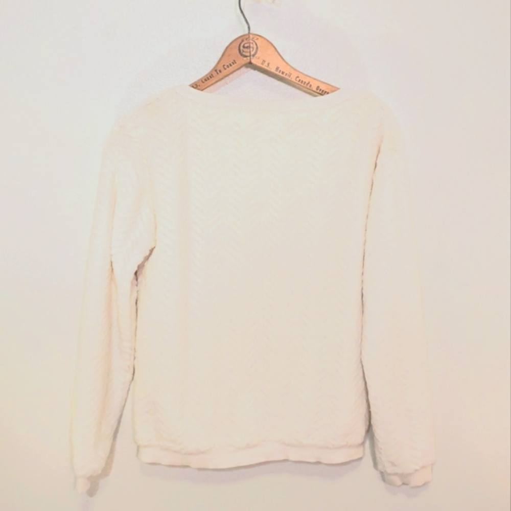 Super soft fuzzy long sleeved sweatshirt.  Size xs.